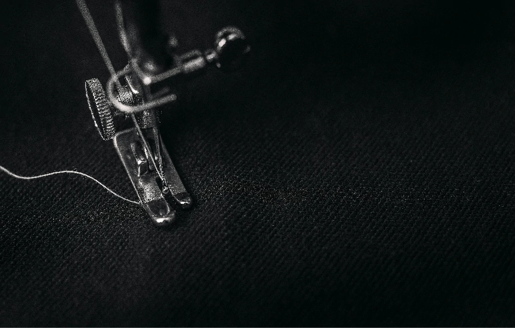 detalle de aguja con hilo@2x