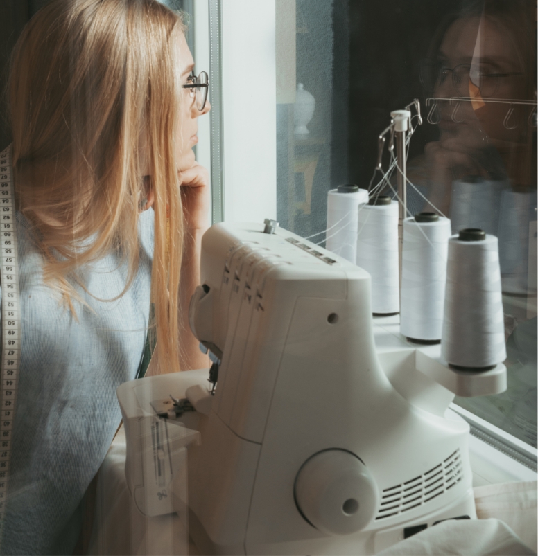 thoughtful-tailor-looking-window